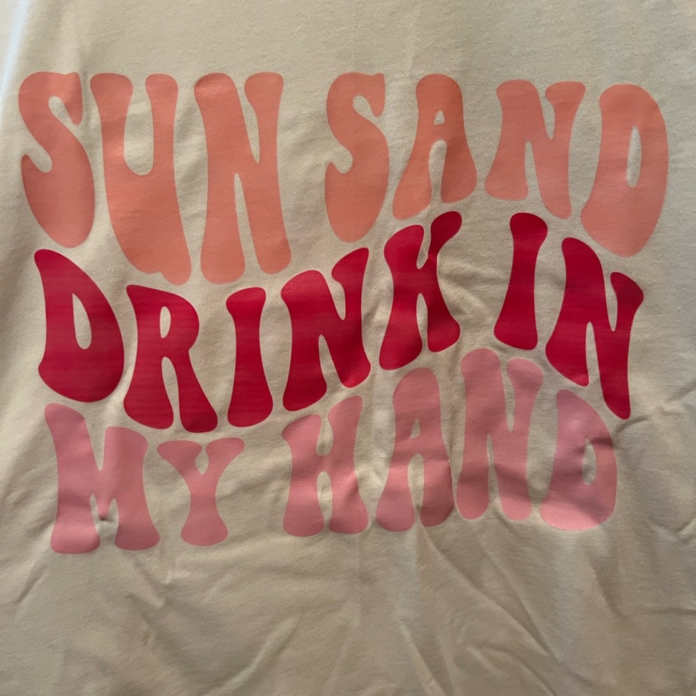 Cream; never used T-shirt “Sun, sand, drink in my hand”